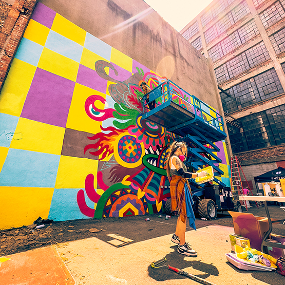 Mural artist at work